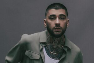 Show de ZAYN durante a turnê The Konakol Tour no Nubank Parque em São Paulo, com público animado e iluminação espetacular.