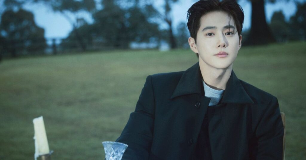 Suho, líder do EXO, se apresentando em um palco durante sua turnê solo no Brasil.